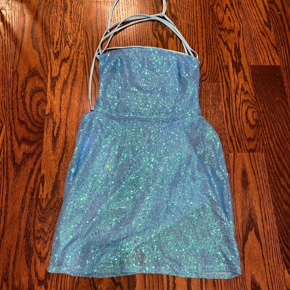 Mini sparkly and backless blue dress with sequins.Lucy in the Sky. Size Medium